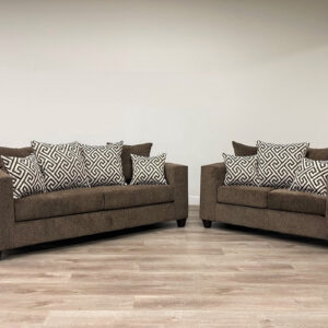 Modern chocolate brown sofa and loveseat set with textured fabric and geometric accent pillows