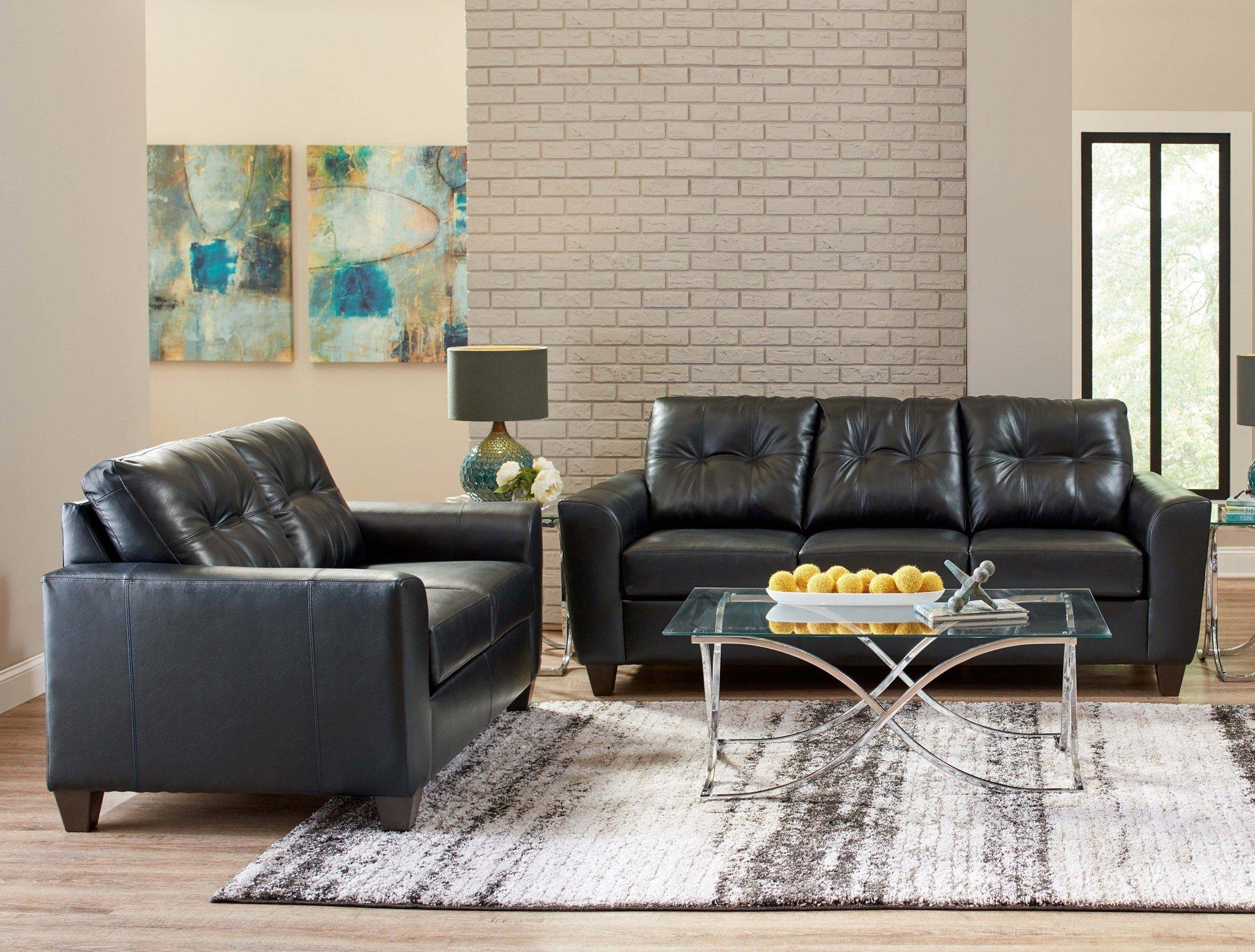 Soft Touch Onyx living room set with black sofa and loveseat in modern leather-look upholstery
