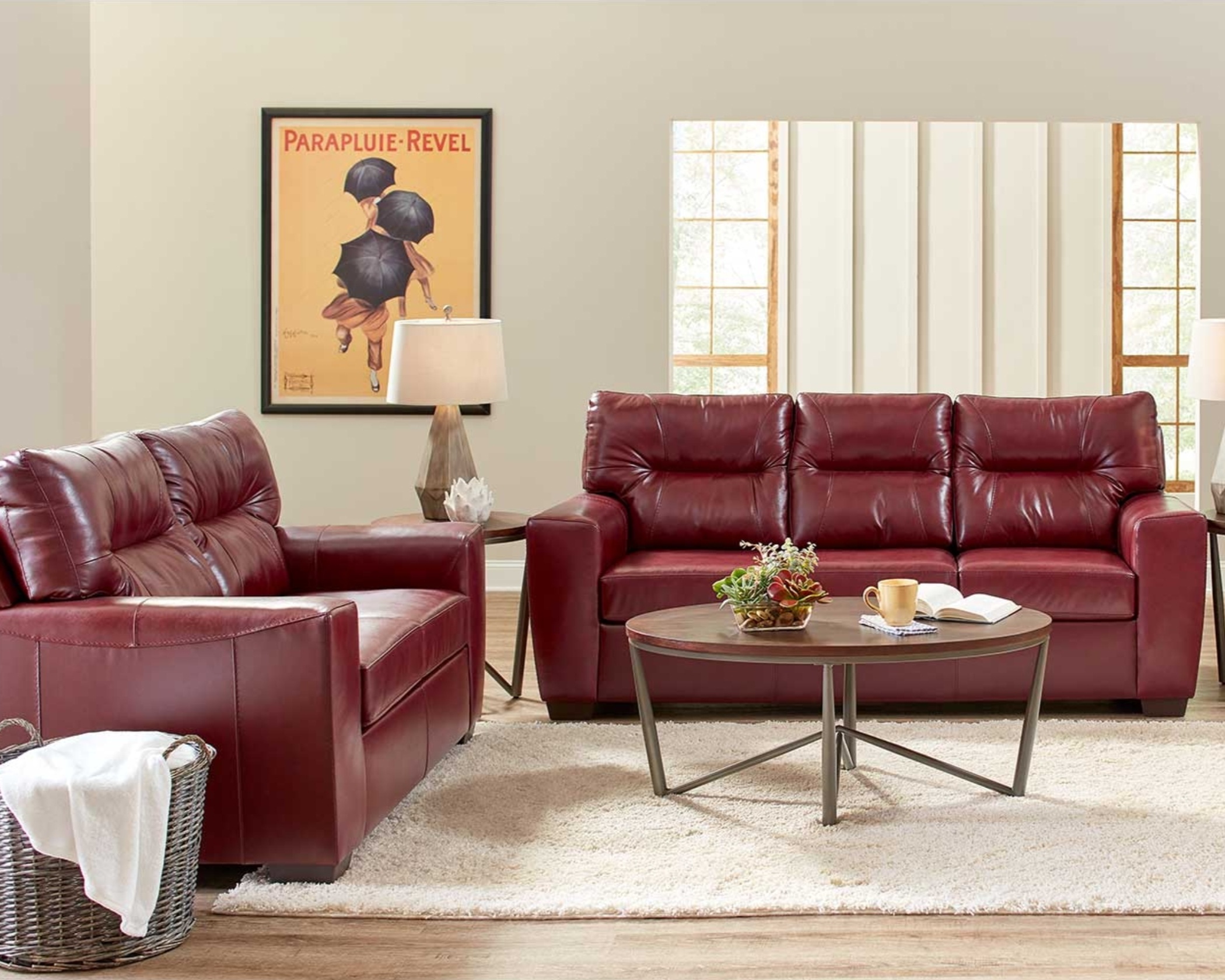 2043 Soft Touch Crimson sofa and loveseat set with rich red leather-look upholstery, plush cushions, and bold contemporary style in a living room