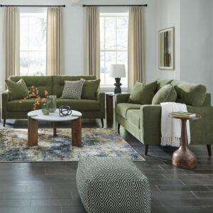 Modern olive green sofa and loveseat set with soft fabric upholstery and plush accent pillows