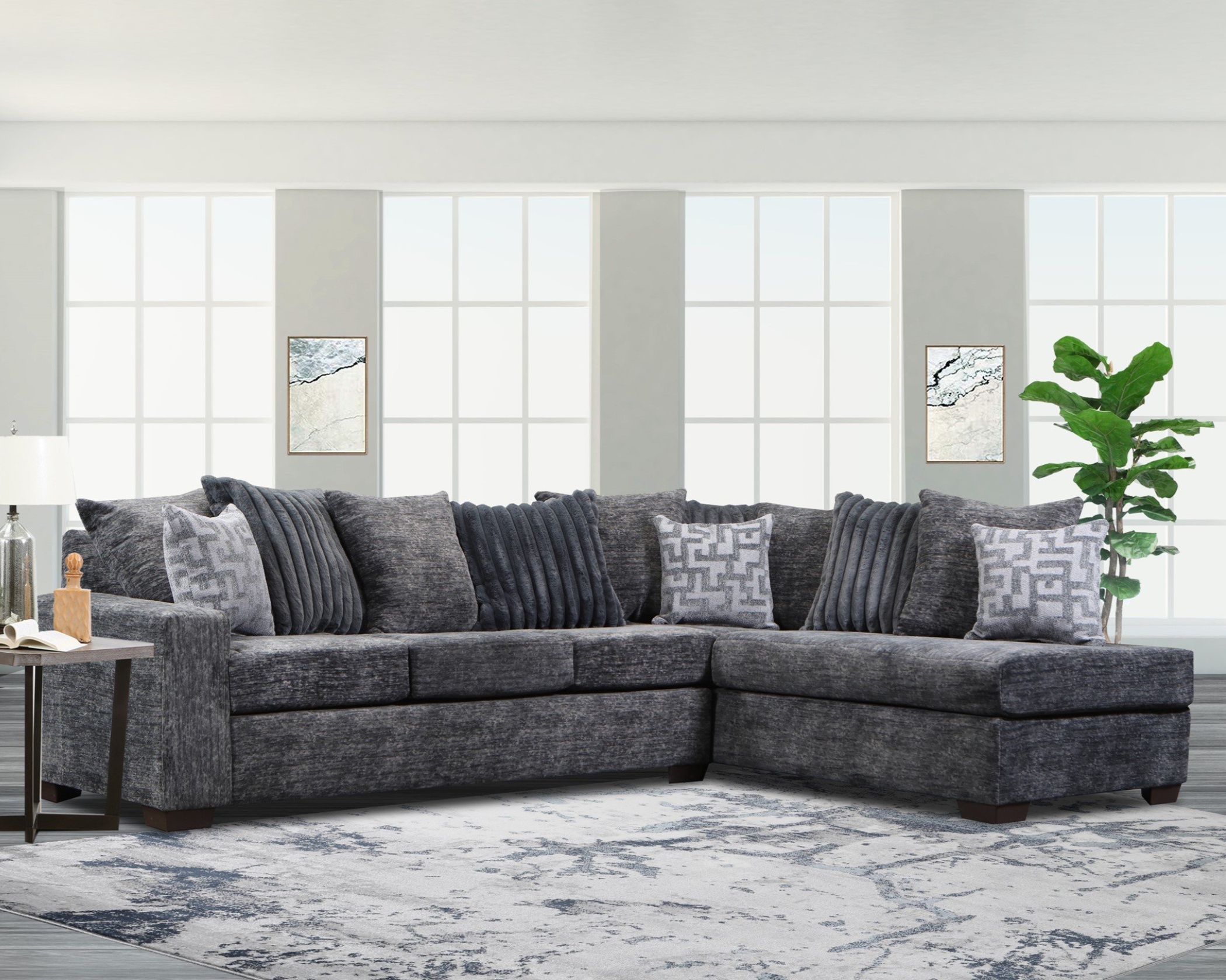 charcoal sectional sofa with chaise and decorative pillows in modern living room setting