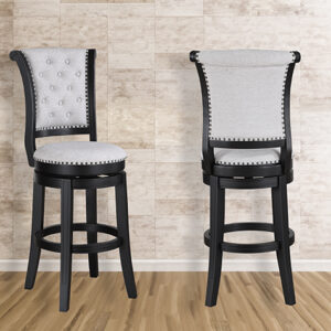 Dove upholstered swivel bar stool with nailhead trim and black wood frame