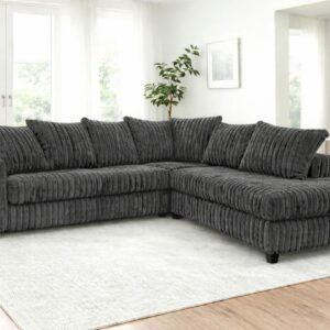charcoal grey corduroy sectional sofa with chaise and plush cushions in modern living room