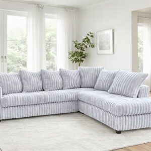 silver corduroy sectional sofa with chaise and plush cushions in modern living room