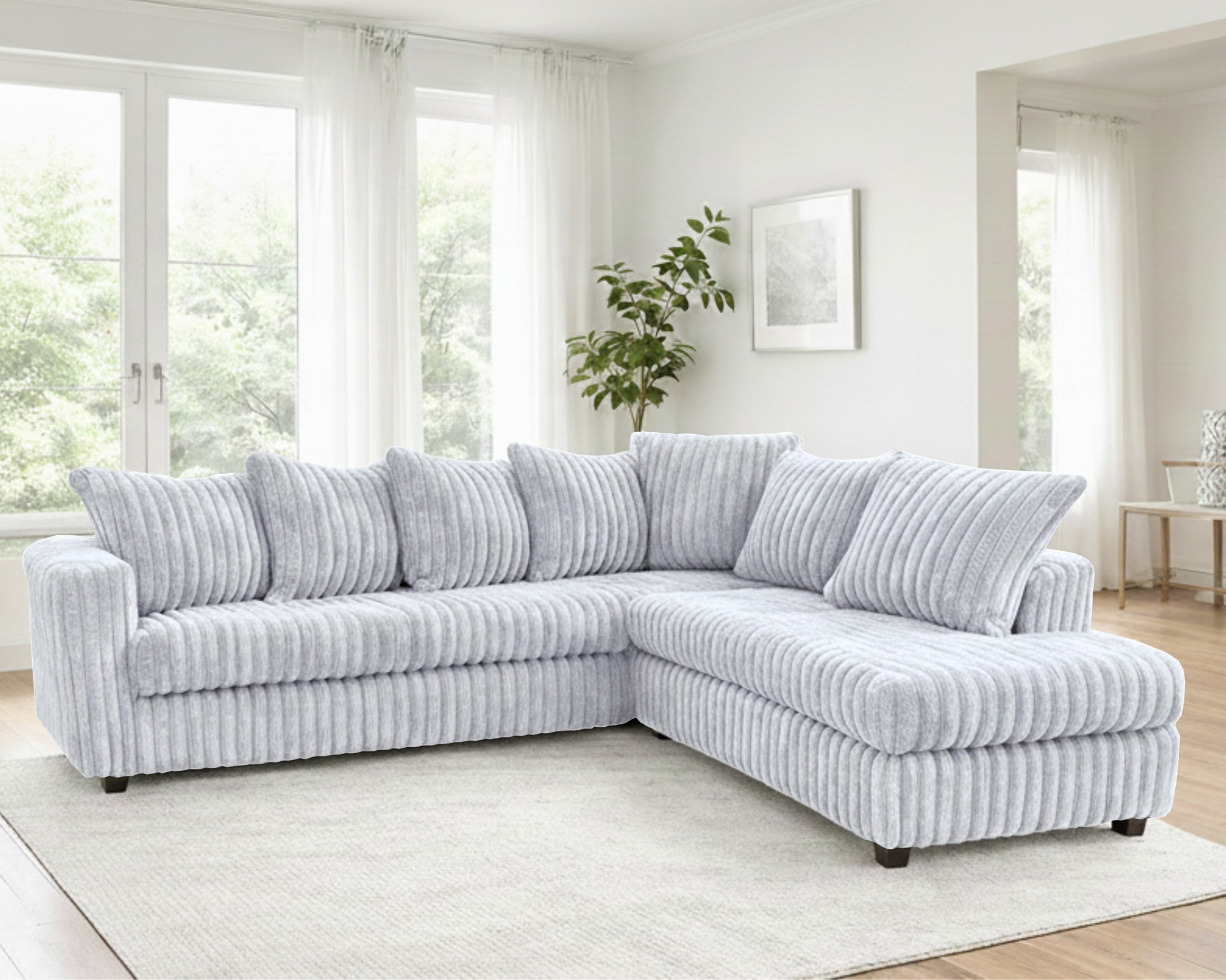 silver corduroy sectional sofa with chaise and plush cushions in modern living room