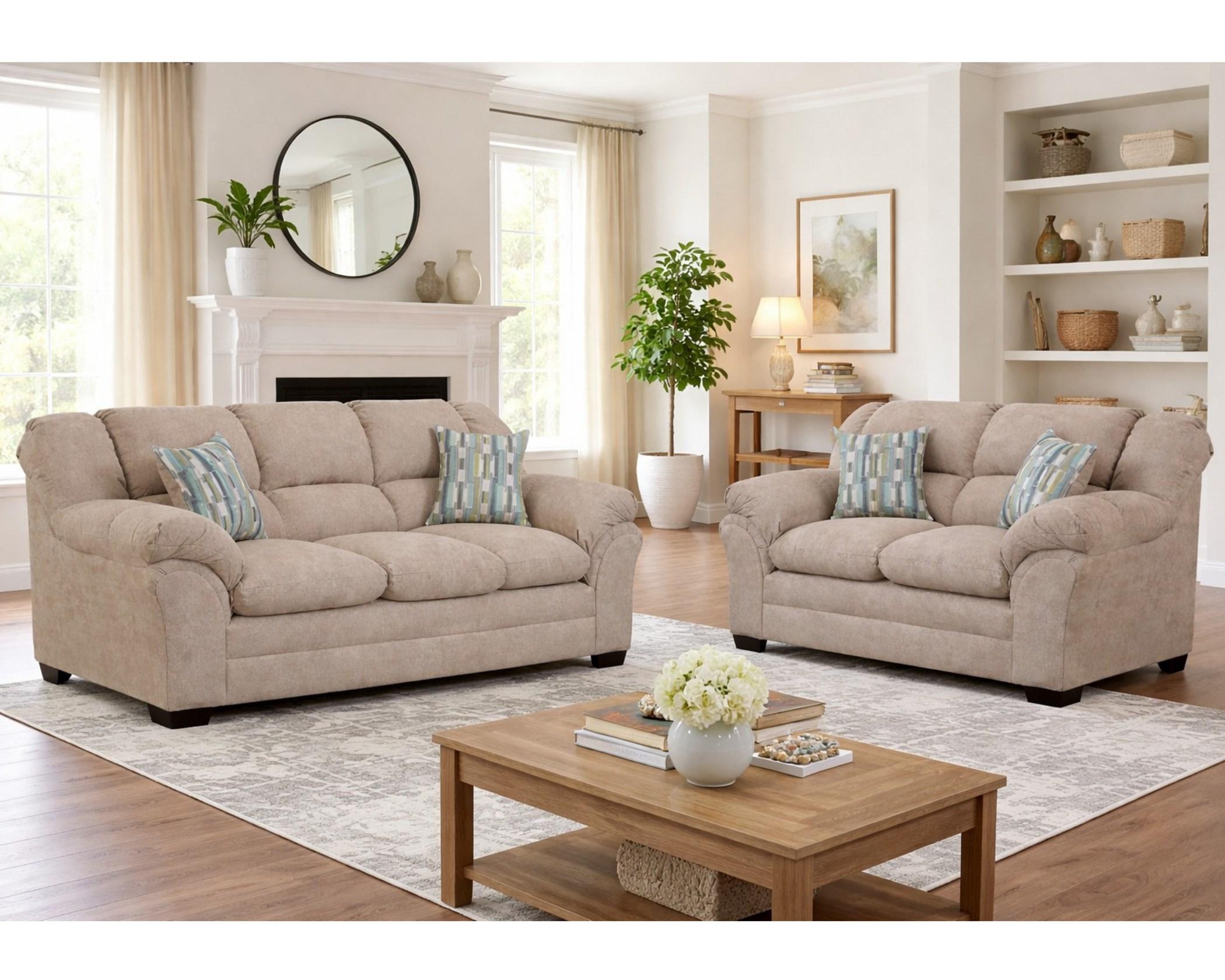 3500 Venus Toast sofa and loveseat set with warm beige upholstery, plush cushions, and accent pillows in a bright living room