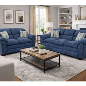 3500 Venus Indigo sofa and loveseat set with blue fabric upholstery, plush cushions, and accent pillows in a bright living room