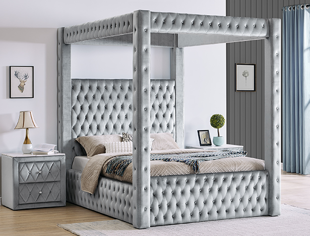 Gray tufted canopy bed frame with upholstered posts and modern luxury bedroom design