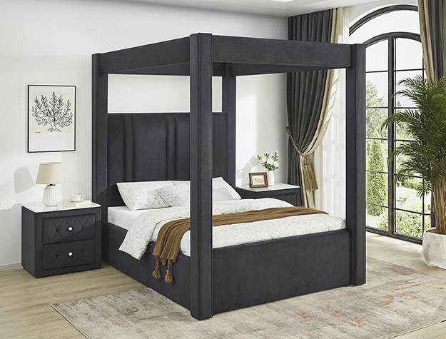 Black upholstered canopy bed frame with modern clean-line design in contemporary bedroom