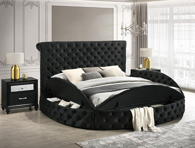 Black tufted upholstered bed frame with lift-up storage base in luxury bedroom setting