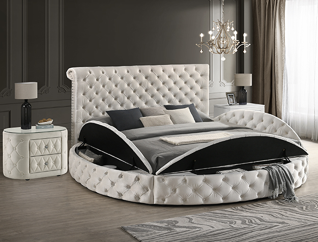 Ivory tufted upholstered bed frame with lift-up storage base in luxury bedroom