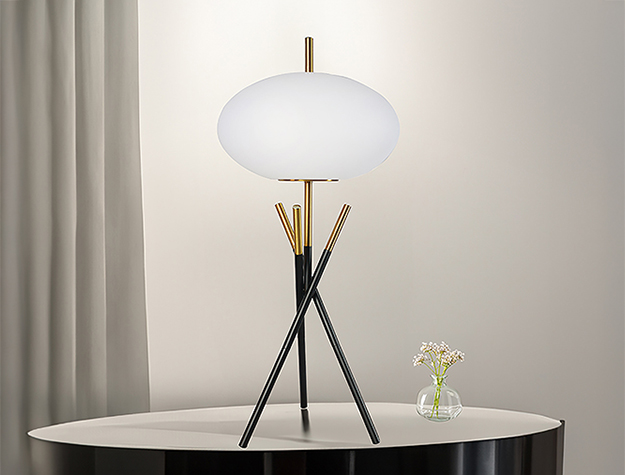 Modern table lamp with tripod base and frosted shade