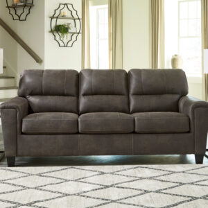 Brown leather-look queen sleeper sofa with plush cushions in a modern living room