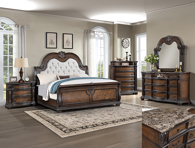 Stanley 7-piece queen/king bedroom set with tufted upholstered headboard, dresser, mirror, chest, and nightstand in a warm brown wood finish.