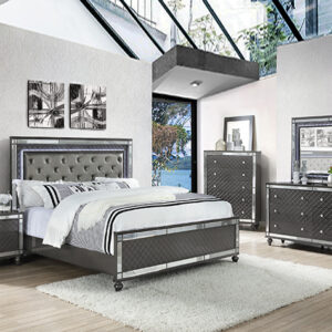 Refino 7-piece king bedroom set with tufted upholstered headboard, dresser, mirror, chest, and nightstand in a metallic gray finish.