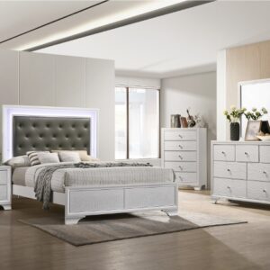 Lyssa frost 7-piece bedroom set with tufted upholstered bed, dresser, mirror, chest, and nightstand in a bright frost finish with glam accents.