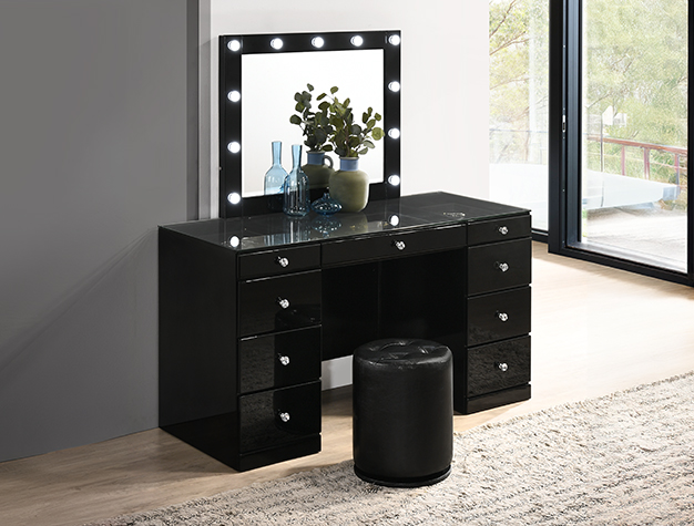 Avery black vanity set with lighted mirror, glass top, and multiple storage drawers.