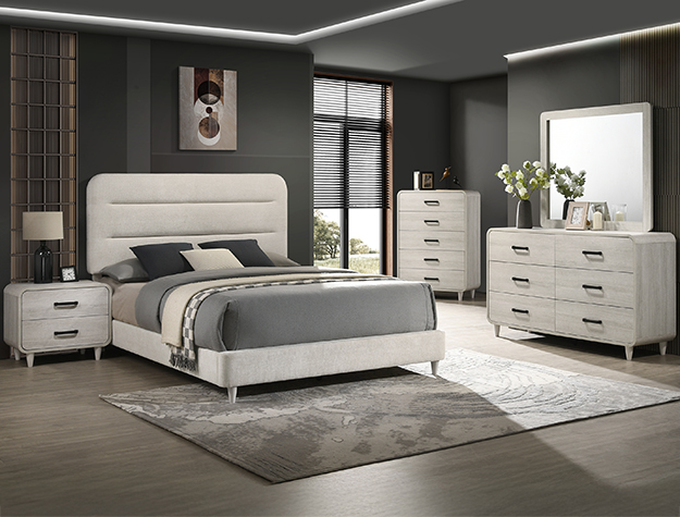 Nyomi white 7-piece bedroom set with upholstered bed, dresser, mirror, chest, and nightstand in a light white finish with modern curved design.