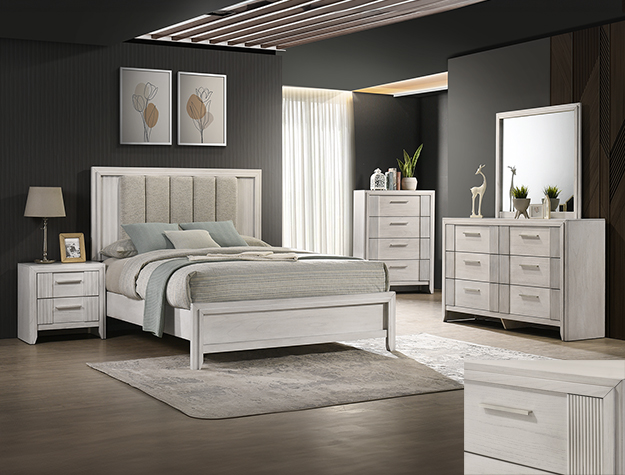 Carlton white 7-piece bedroom set with upholstered panel bed, dresser, mirror, chest, and nightstand in a white finish with modern clean design.