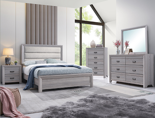 Adelaide upholstered 7-piece bedroom set with upholstered panel bed, dresser, mirror, chest, and nightstand in a driftwood gray finish with modern hardware.