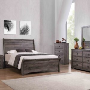 Coralee grey 7-piece bedroom set with rustic sleigh-style bed, dresser, mirror, chest, and nightstand in a weathered gray wood finish with simple hardware.