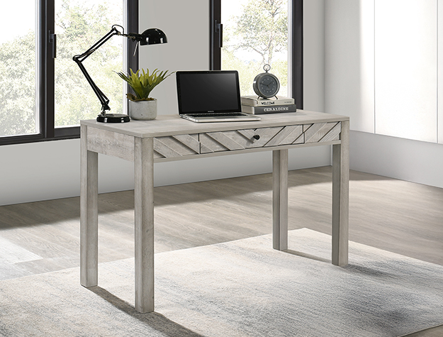 Modern writing desk with chevron drawer design and light wood finish