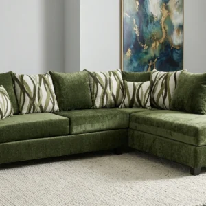 Modern green sectional sofa with chaise lounge and decorative accent pillows