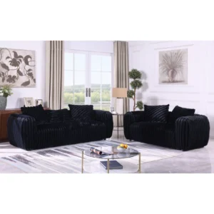 Modern black boucle living room set featuring curved sofa and loveseat with soft textured upholstery and contemporary styling