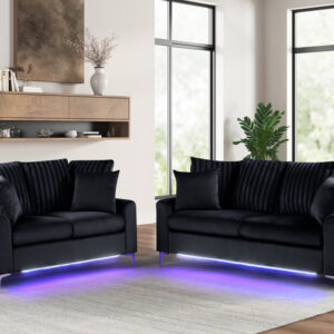 Modern black sofa and loveseat set with LED lighting and plush velvet-style cushions