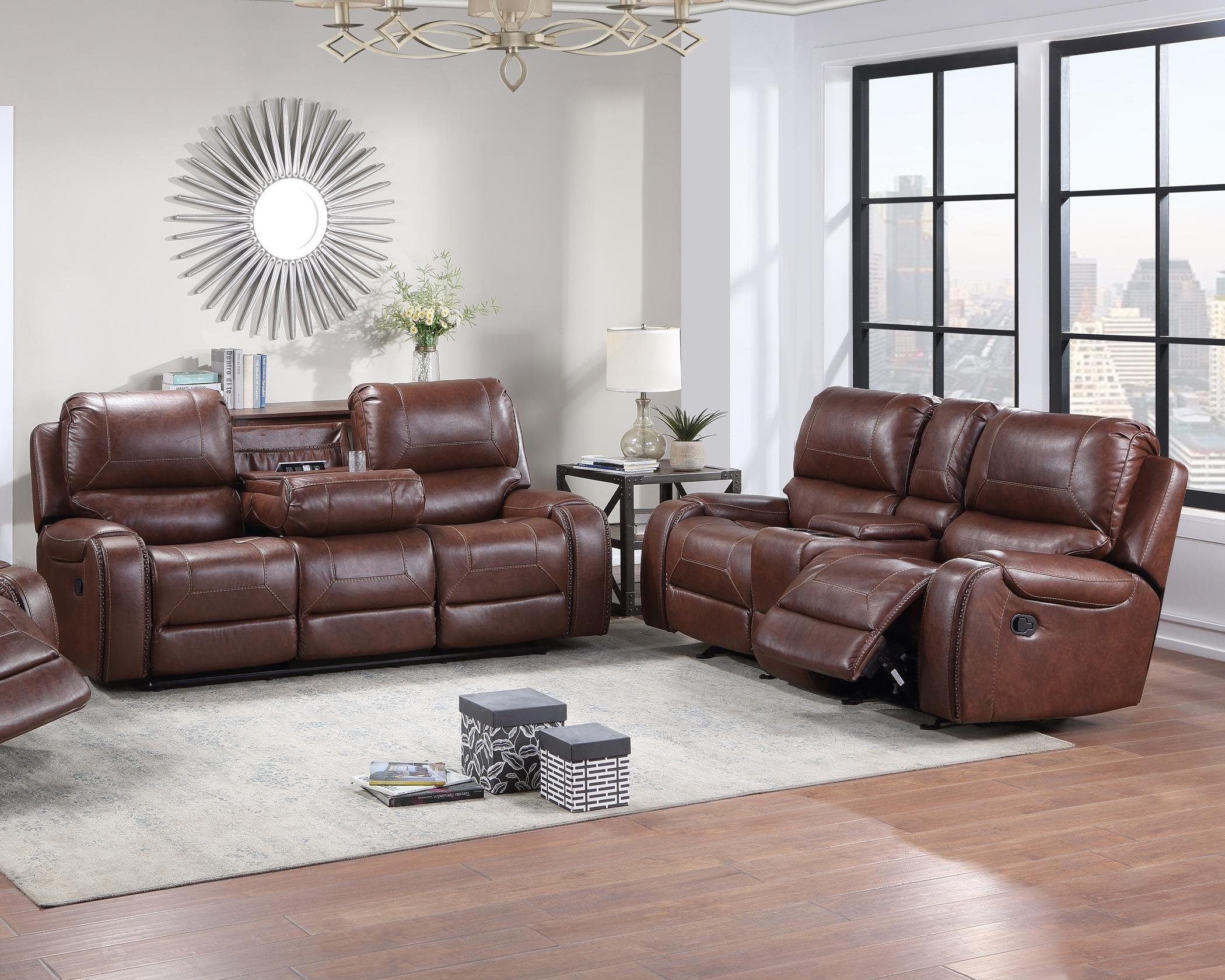 brown leather reclining sofa and loveseat set with nailhead trim in modern living room